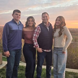 Julie Aust with her daughter, Amelia, husband, John, and son, Matt.
