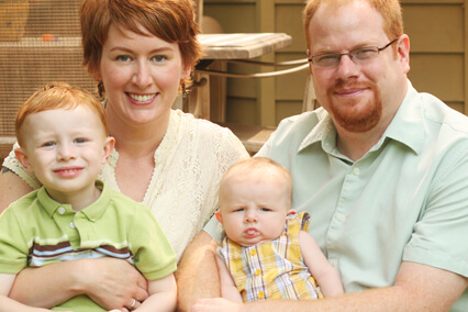 Family portrait of mom, dad, two kids