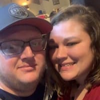Close-up selfie of two people smiling