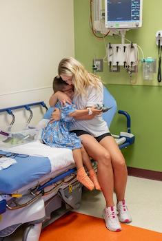 image of patient hugging adult family member