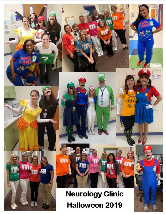 group photo of residents in costumes for Halloween