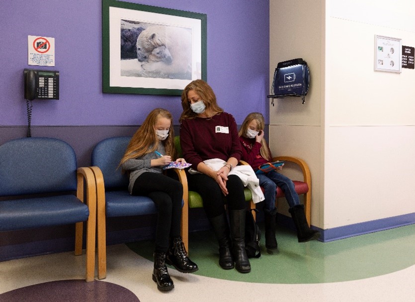 photo of family in the waiting area of the area where infusions are given