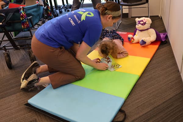 Photo of staff and family enjoying the Cerebral Palsy Day activities at Children's Mercy