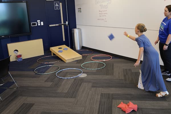 Photo of family enjoying the Cerebral Palsy Day activities at Children's Mercy