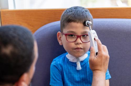 image of patient getting temperature taken on forehead