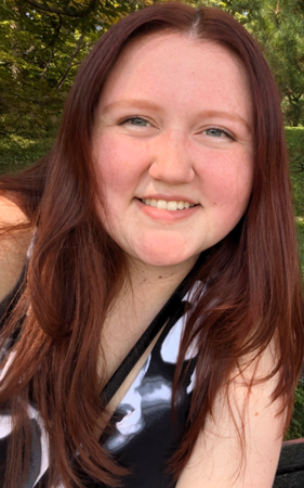 Addison Leabo. She has long auburn hair.